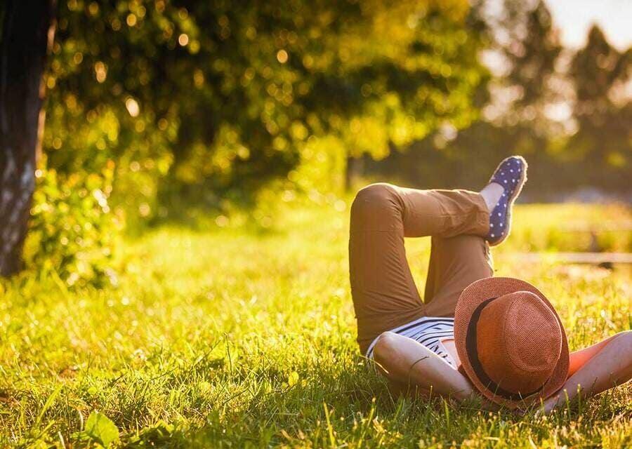 Person lying down on the grass
